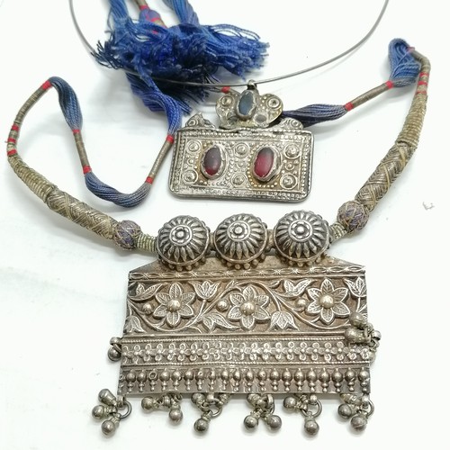 701 - 2 unmarked silver ethnic necklaces, Scottish hand worked cuff bangle, antique spectacles etc.