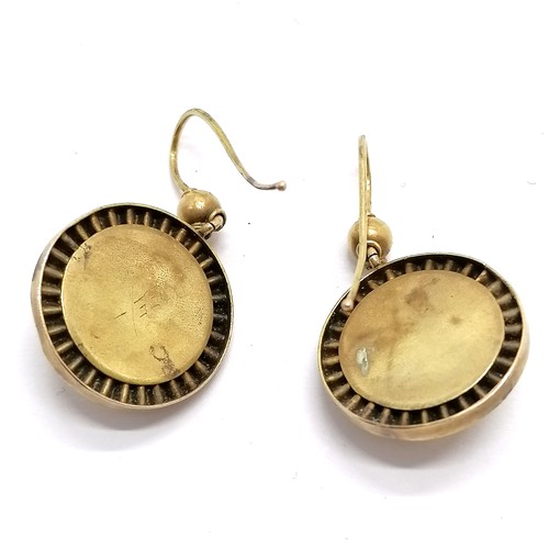 705 - Pair of antique unmarked gold target design earrings 4.9g- both have dents