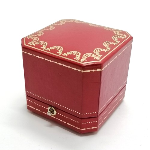 714 - Cartier red leather ring box 5.8cm x 5.8cm x 5cm high. In good used condition