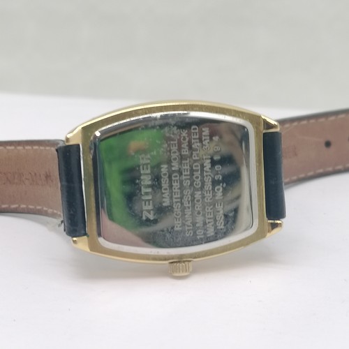 773 - Boxed Zeitner Madison gents gold tone quartz wristwatch cushion cased 28mm across, boxed ladies Orvi... 