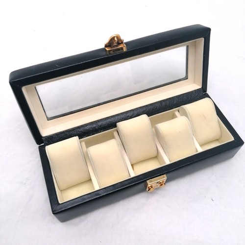 775 - Black leather watch display box with a glass lid 29cm x 11cm x 8cm high by Dulwich designs