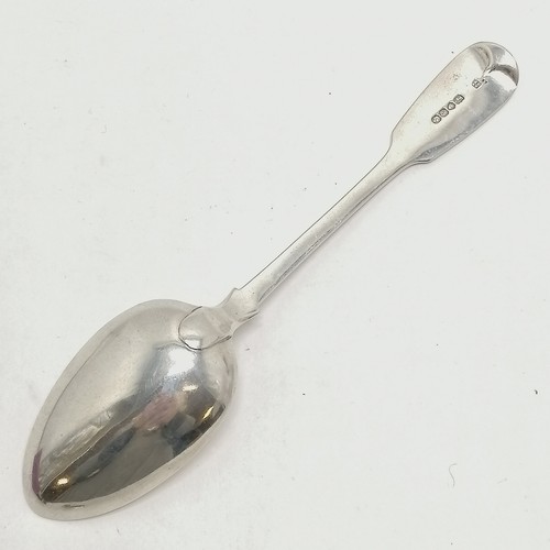 823 - Victorian silver hallmarked tablespoon with armorial dog crest 22.5cm & 83g. In good used condition