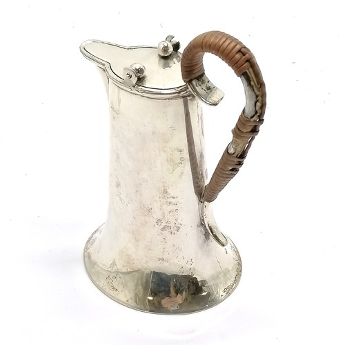 842 - Chester silver swing lidded hot milk jug with raffia decorated handle (some losses) - 12cm high & 19... 