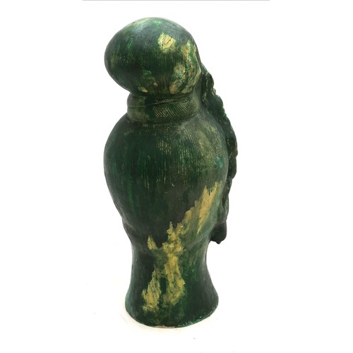 26 - Chinese pottery Buddist head with a green glaze - 37cm high and has some restoration