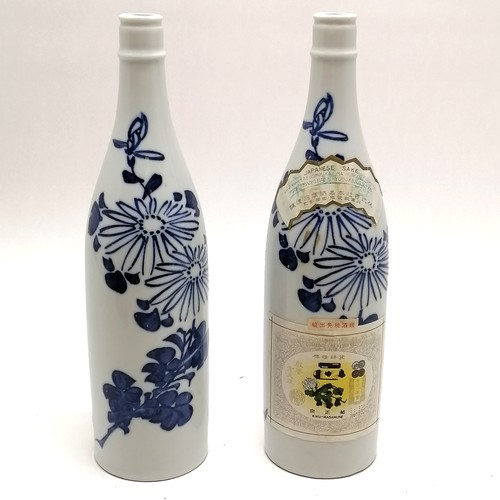 39 - Pair of (empty) vintage Sake bottles - 1 with original label & 29cm high