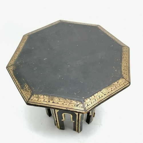 44 - Small folding oriental black lacquer table with gilded decoration. 31cm high x 30cm. Some wear to th... 