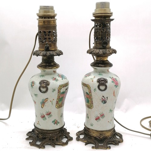 55 - Pair of antique Chinese porcelain and gilt metal mounted lamps 41cm high with figural panels and lio... 