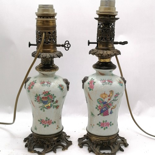 55 - Pair of antique Chinese porcelain and gilt metal mounted lamps 41cm high with figural panels and lio... 