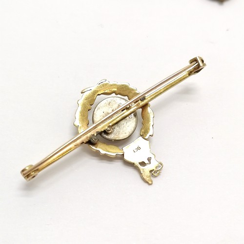 118 - 9ct marked gold Royal Marines sweetheart bar brooch with white metal globe in centyre and red enamel... 