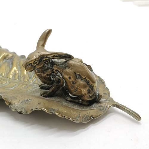 181 - Novelty antique brass pen tray in the form of a leaf with rabbit detail 32cm long