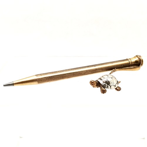 184 - 14 ct rolled gold propelling pencil, t/w Italian silver 800 tortoise 3 cm in length.