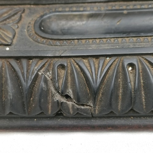 197 - Antique carved ebony desk stand with original inkwells and covers and an elephant on the central lid... 