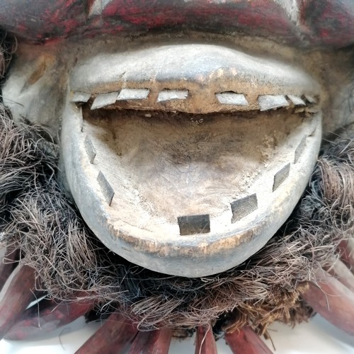 217 - African tribal wooden mask with metal teeth detail and wooden bead detail - 43cm high ~ slight rub t... 