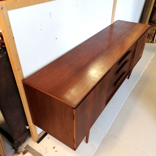 244 - Mid 20th C teak sideboard . 183cm x 46cm x 80cm. In overall good used condition.