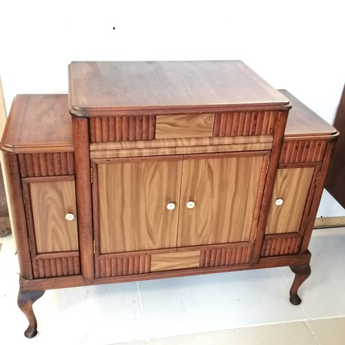 246 - 1950s mahogany radiogram with a Garrard autoslim 4 speed record player and a radio and storage for L... 