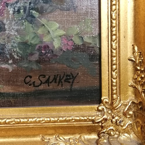 251 - Gilt framed oil painting of flowers signed C Sankey, frame 61cm x 50cm. No obvious damage