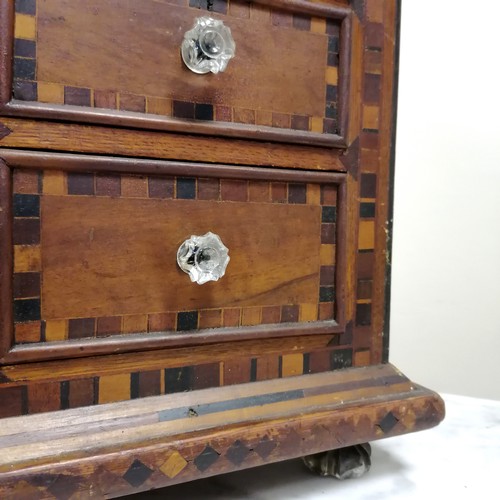 254 - 19th C continental inlaid 8 drawer mahogany table cabinet. 50cm wide x 33cm deep x 50cm high. Damage... 