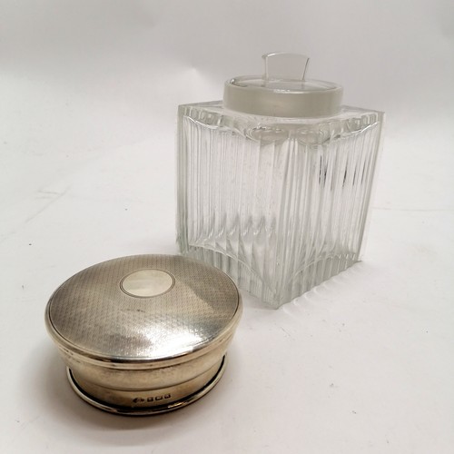 277 - Large square topped silver hallmarked jar with ribbed detail. Has chips to the body.