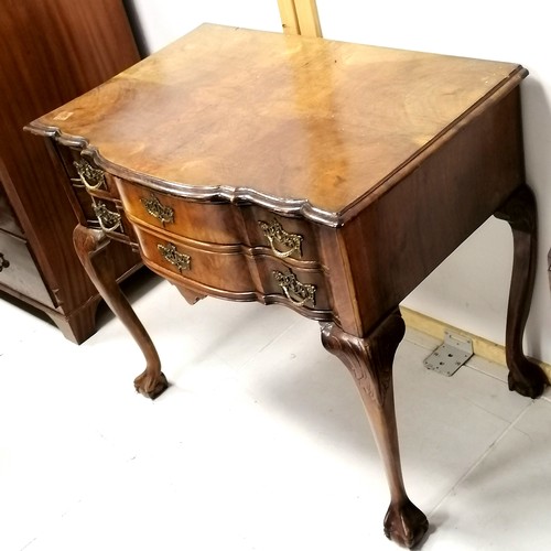 282 - Walnut 3 drawer serpentine fronted side table with lions paw feet 80cm x 53cm deep x 71cm high