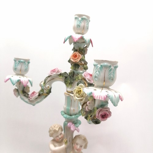 285 - Continental marked porcelain 2 part figural candelabrum with encrusted flower decoration 48cm high- ... 