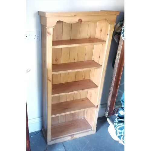 286 - Small pine shelf unit. 130cm x 60cm x 23cm. In overall good used condition.