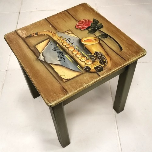 301 - Small painted side table with musical instrument painted to the top.