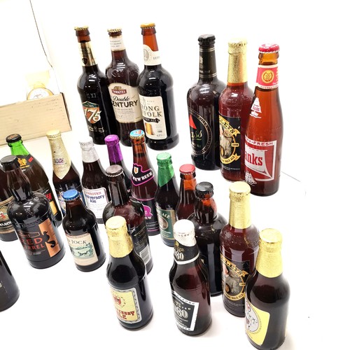 315 - Large collection of bottled real ale to include Bass, Exmoor gold, Barbar etc.