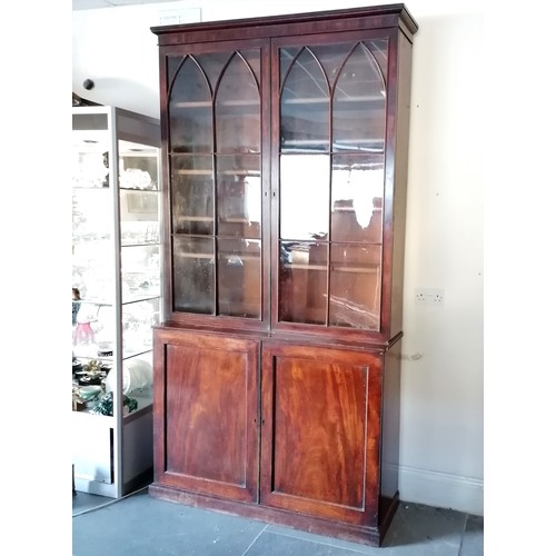 355 - Antique Mahogany 4 part glazed bookcase 235cm high x 125cm wide x 38cm deep. In overall good used co... 