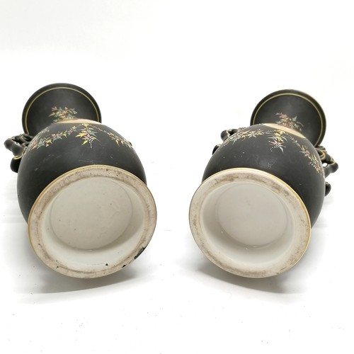 358 - Pair of antique mantle vases with portrait cartouches to centres on a black ground  with gilded deco... 