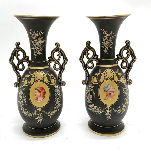 358 - Pair of antique mantle vases with portrait cartouches to centres on a black ground  with gilded deco... 