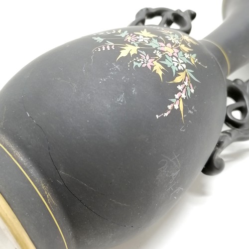 358 - Pair of antique mantle vases with portrait cartouches to centres on a black ground  with gilded deco... 