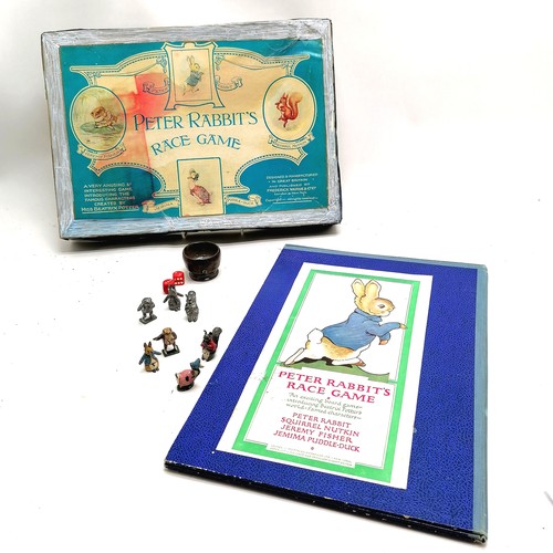 376 - Boxed Peter Rabbit's race game by Fredrick Warne & Co Limited with x4 hand painted lead figures and ... 