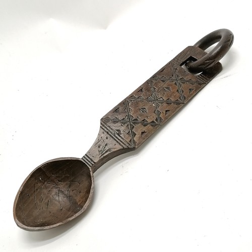 377 - Hand carved wooden love spoon 28cm long.