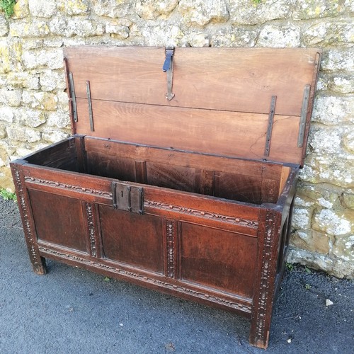 379 - Antique oak coffer 142cm long, 56 cm deep x 72cm high. Split to the lid some old signs of worm to th... 