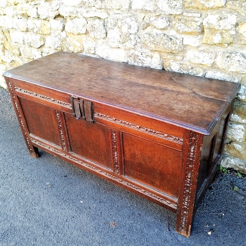 379 - Antique oak coffer 142cm long, 56 cm deep x 72cm high. Split to the lid some old signs of worm to th... 