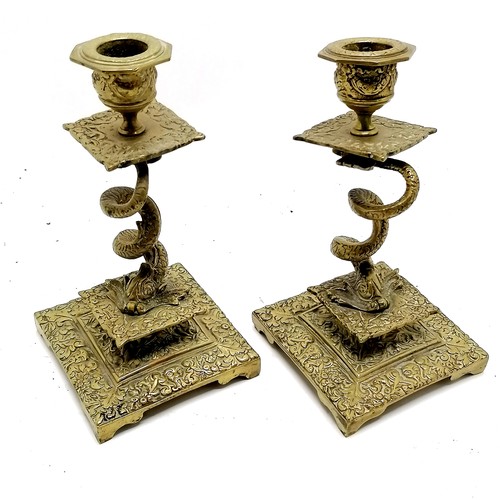 390 - Antique brass candlesticks with dolphin detail to column - 18cm high ~ 1 top loose otherwise no obvi... 