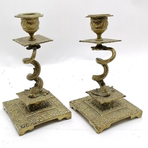 390 - Antique brass candlesticks with dolphin detail to column - 18cm high ~ 1 top loose otherwise no obvi... 