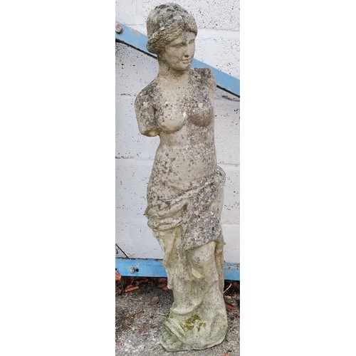 472 - Garden statue of a woman.