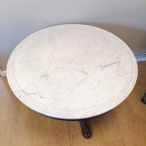 482 - Antique mahogany marble topped circular peddastool centre table. With lion paw detail to the feet. W... 