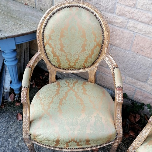 483 - Pair of French upholstered gilt wood armchairs With open arms. D55cm x W60cm x H93cm. In overall goo... 