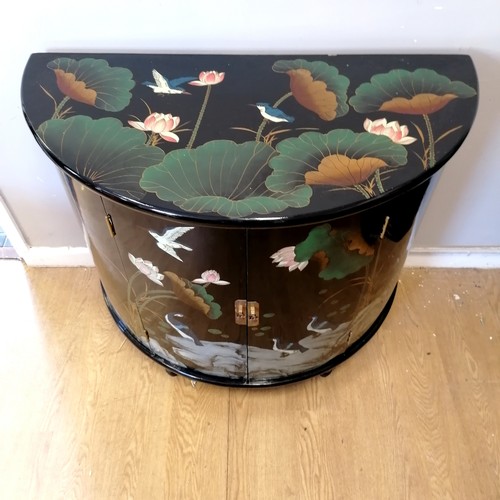 485 - Contemporary oriental black lacquer 2 door sideboard with bird and flower detail. W100 x D50cm x H73... 