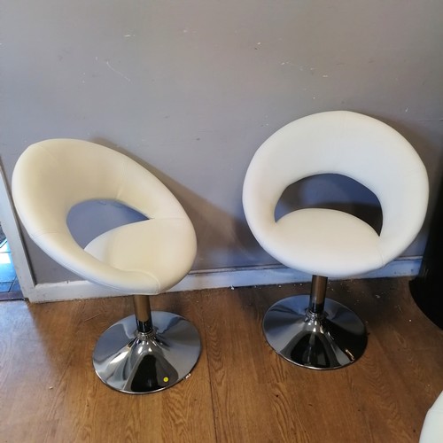 487 - Set of 4 contemporary chrome and white upholstered swivel chairs. H80cm x D40cm x W58cm.