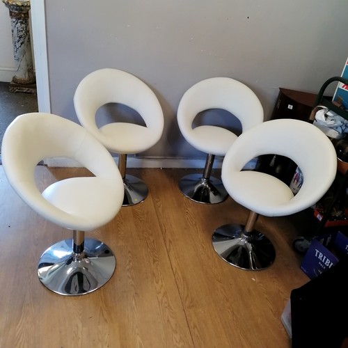 487 - Set of 4 contemporary chrome and white upholstered swivel chairs. H80cm x D40cm x W58cm.