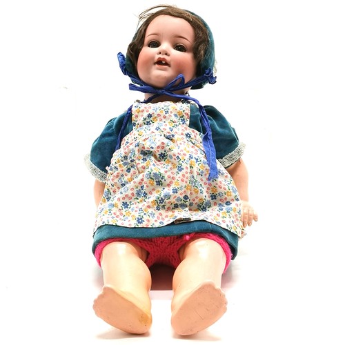 490 - Armand Marseille china headed doll- 996- missing 1 tooth, chip to 1 finger and has pen marks to the ... 