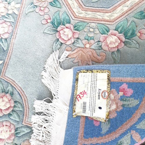 497 - Chinese good quality blue ground rug with central floral medallion 93cm width x 155cm  length.