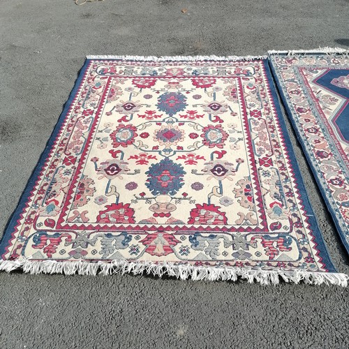 499 - 3 x blue ground carpets 230 cm x 168 cm in used condition