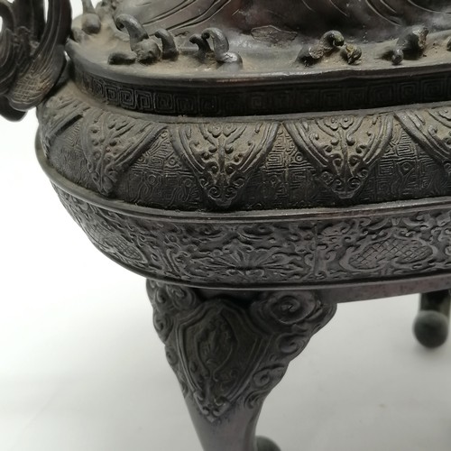 14 - Large Oriental bronze censor with wave decoration to the lid and stylised dolphin handles, signed wi... 