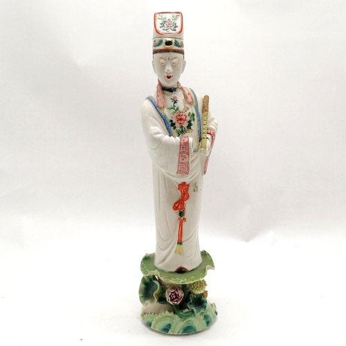 27 - Oriental pottery figure standing on a lotus leaf 33cm high A/F