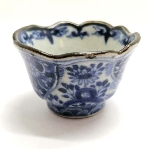 41 - Antique Oriental blue & white small teacup with marks to base - 3cm high ~ has losses of glaze to th... 