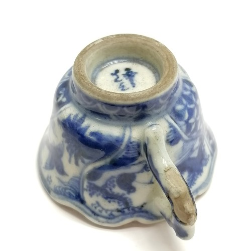 41 - Antique Oriental blue & white small teacup with marks to base - 3cm high ~ has losses of glaze to th... 